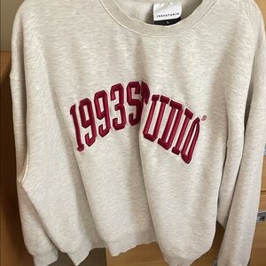 Studio Women's Light Beige Crew Neck Sweater with Bold Red Text